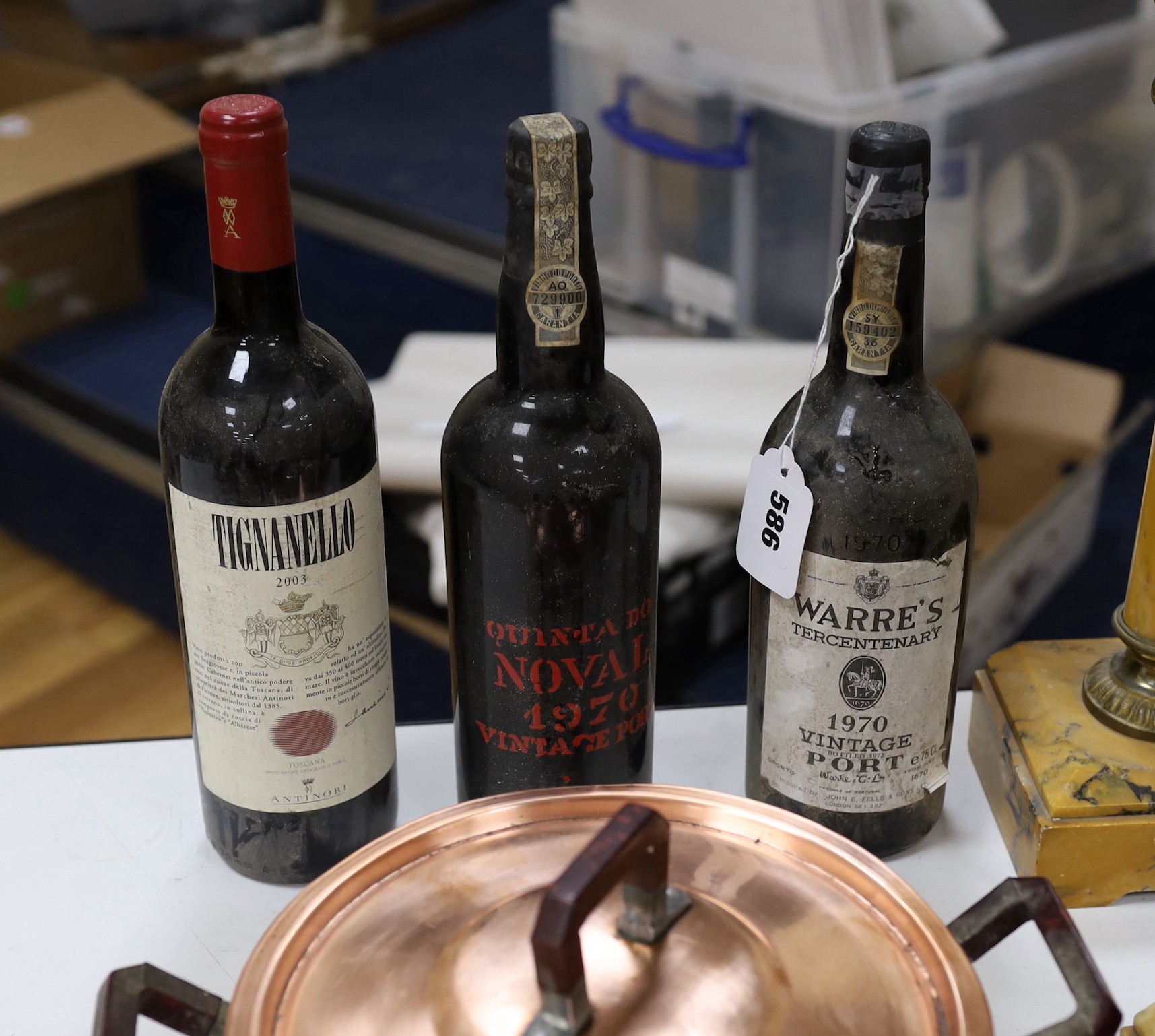 One bottle of Warres 1970 Vintage Port, one bottle of Quinta Do Noval 1970 Vintage Port and one bottle of Tignanello, 2003 red wine.